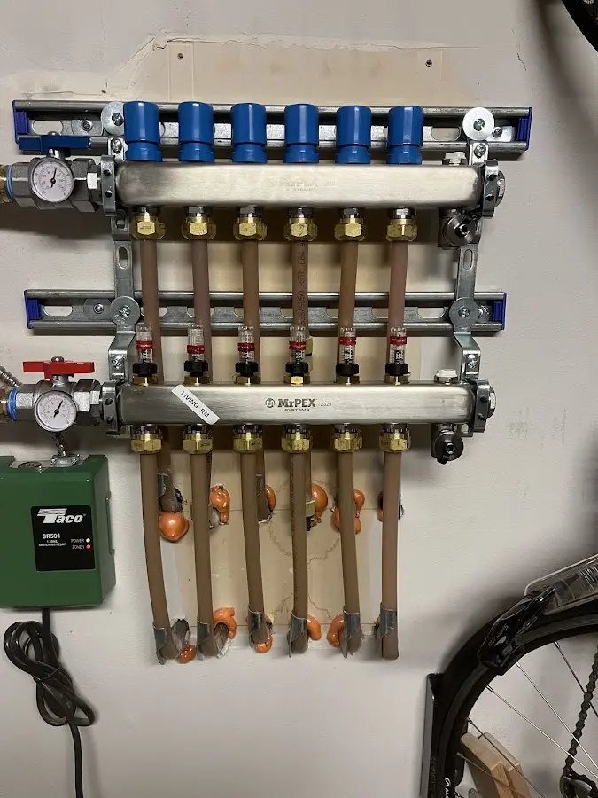 Plumber performing Gas Line Installation at a residential property in Otsego